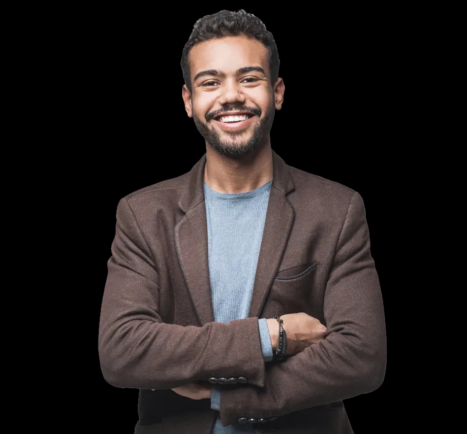 Portrait of a professional team member at Coinstash, radiating confidence with a warm smile, smartly dressed in a brown blazer and blue sweater.